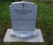 WCY27 - 2'6" Honed Light Grey Peon with Scotia Shoulders style Headstone, with panelled Rose design and a Cross Design painted Black.