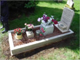 WK1 - White Marble Kerbset with Small Headstone, Brown Chippings and White Marble Vases.