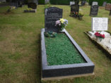 WK3 - All Polished Blue Pearl Single Kerbset with Green Chippings and a Rose design on the Headstone.