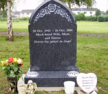 WCE15 - 2'10" All Polished Flint Grey Gothic style Headstone with a Carved Roses design.