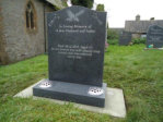 WCY31 - 2'6" Honed Dark Grey Ogee style Headstone, with Blasted Hammer, Spanner and Bird design.