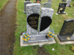 WB1 - Rustic Split Headstone with an All Polished Black Granite Broken Heart and Black Granite section on the base.